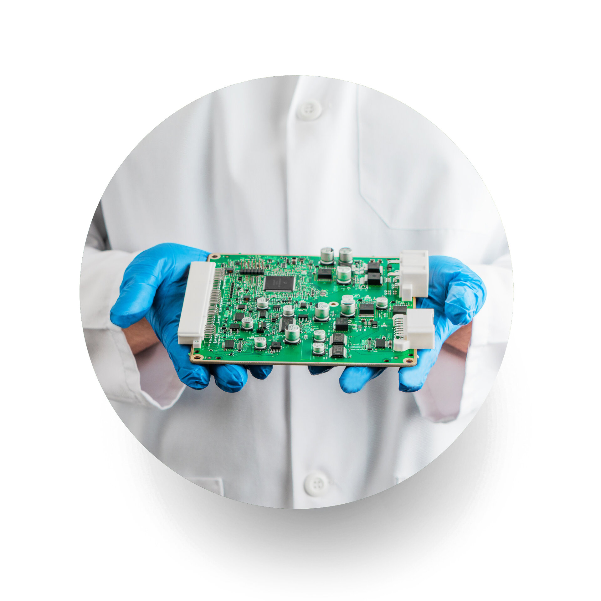 engineer holding circuit board with gloves on