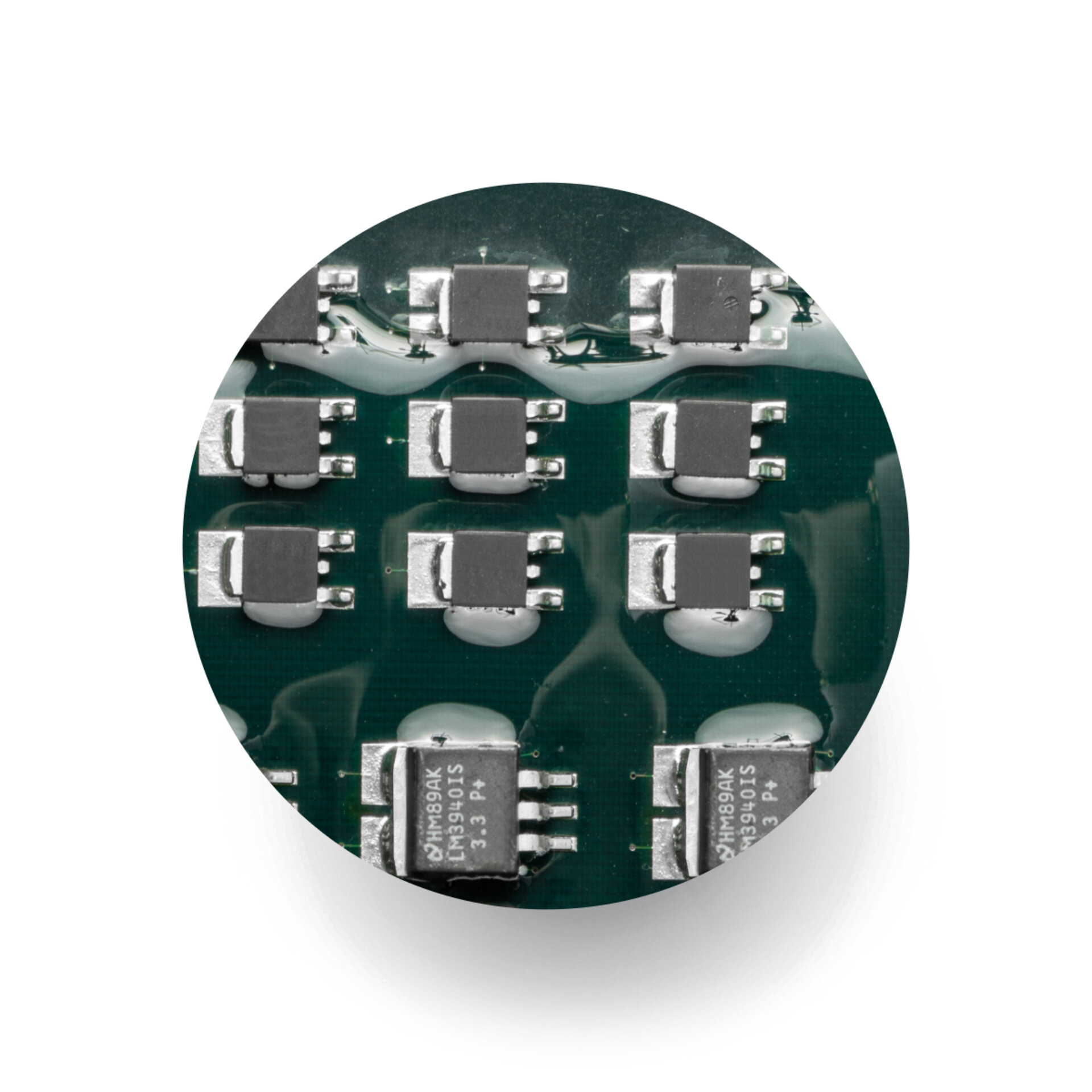 closeup of circuit board components covered in conformal coating